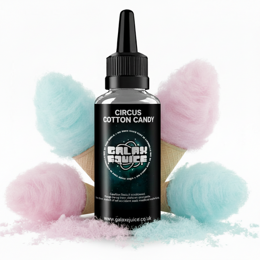 Bottle of Galax-E-Juice Circus Cotton Candy E-Liquid 100ml Shortfill with candy floss on a white background
