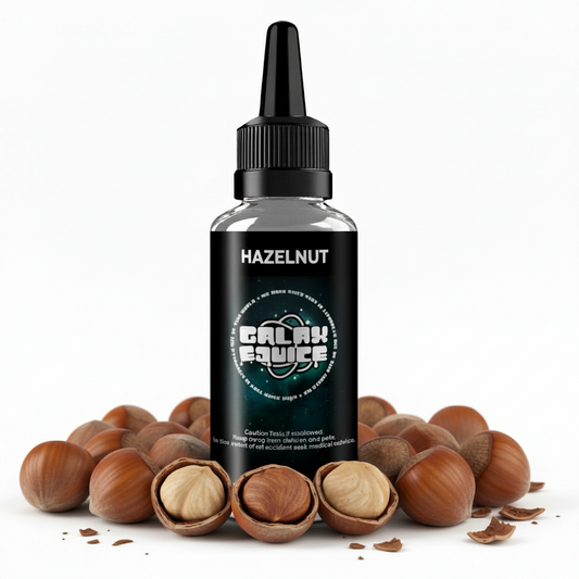 Bottle of Galax-E-Juice Hazelnut E-Liquid 100ml Shortfill with hazelnuts on a white background