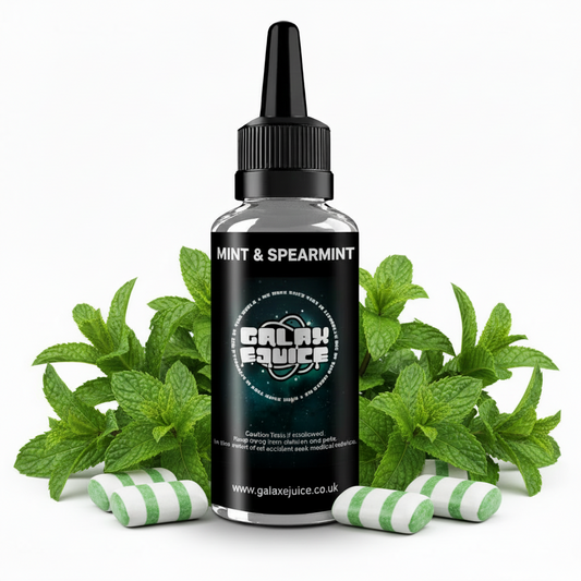 Bottle of Galax-E-Juice Mint & Spearmint E-Liquid 100ml Shortfill with mint and spearmint leaves on a white background